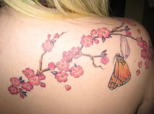 Cherry Tattoos: Blume Tattoos Design für Frauen