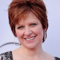 Caroline Manzo Layered Short Red Pixie Hairstyle for Mature Women Over 50