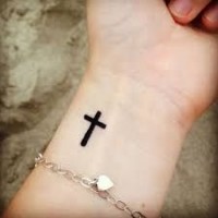 20 Best Tattoo Designs For Women 2024 Cute Tattoo Ideas Pretty Designs   Cross Tattoo 200x200 